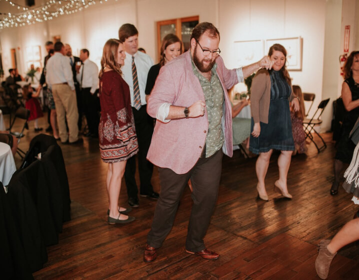 Someone dancing at a wedding on the dance floor