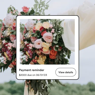 Close-up of elegant white wedding bouquet with roses and greenery