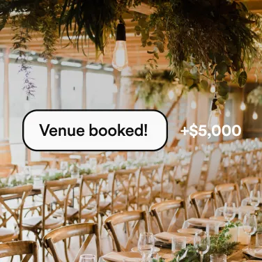 Outdoor wedding ceremony venue with floral arch and seating