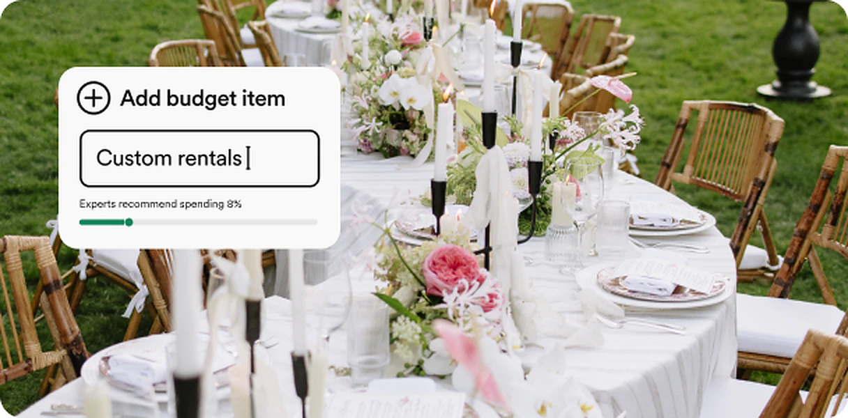 Outdoor wedding reception table with Zola budget item entry
