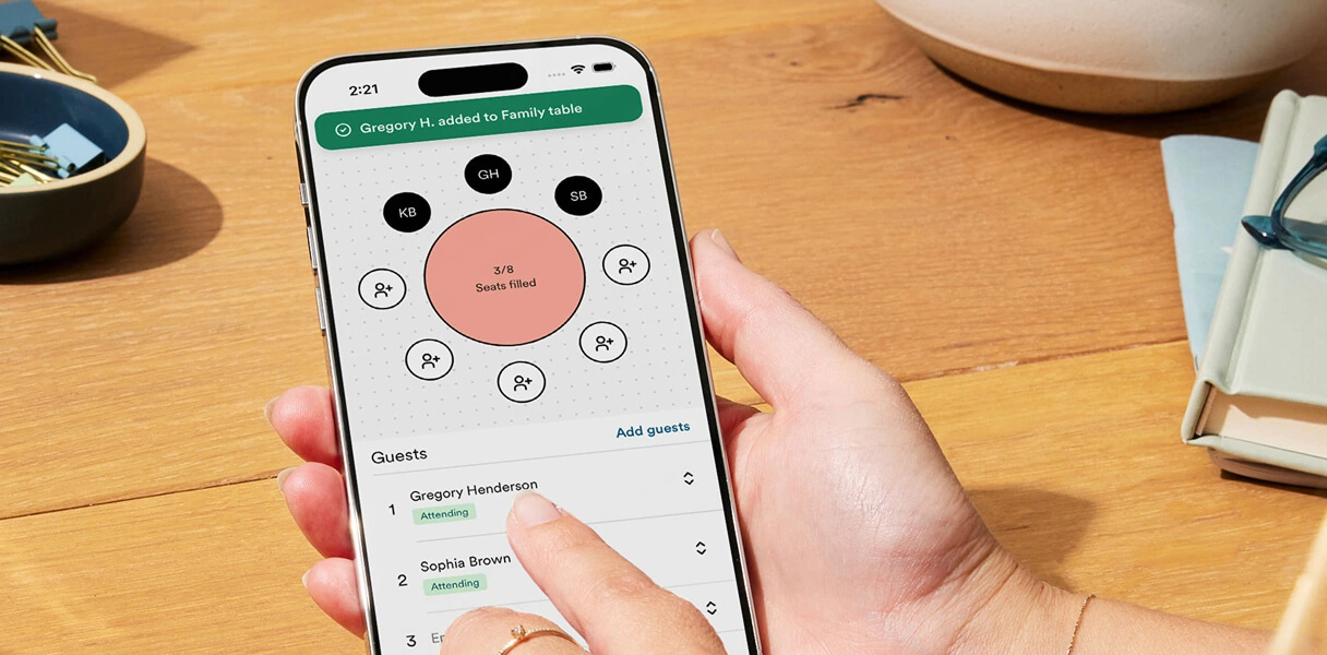 Zola iOS app confirming a guest was added to a table