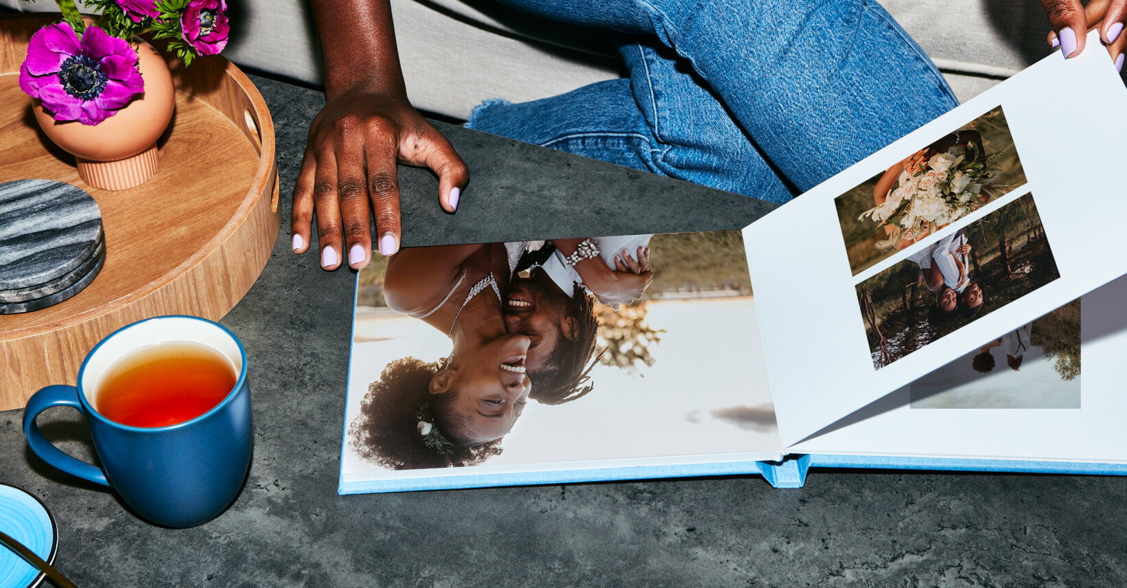 Person looking at Wedding Album