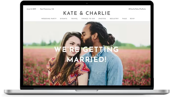 A laptop showing the Kate & Charlie Zola wedding website